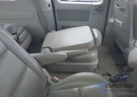 2004 Ford Freestar Limited из США, поврежденный, VIN 2FMDA58204BA42606